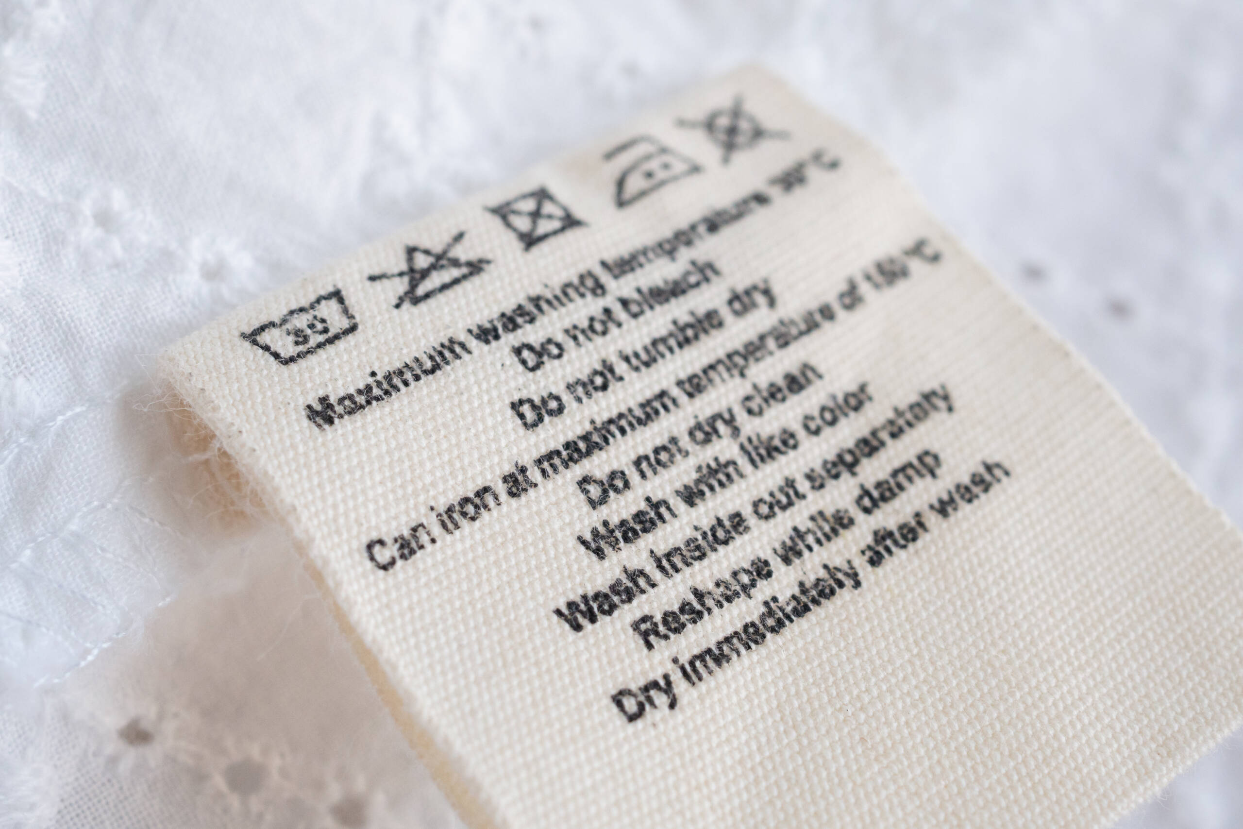 wash and care label on clothes